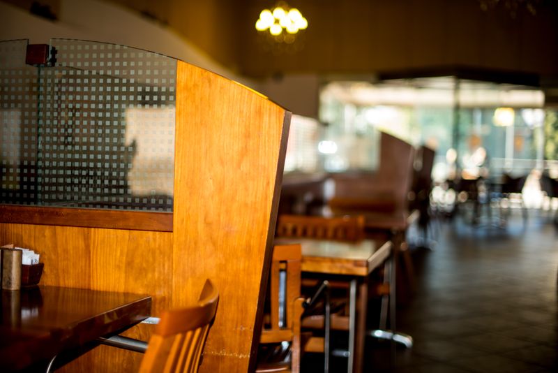 Pizza luce restaurant interior with warm lighting and pizza oven