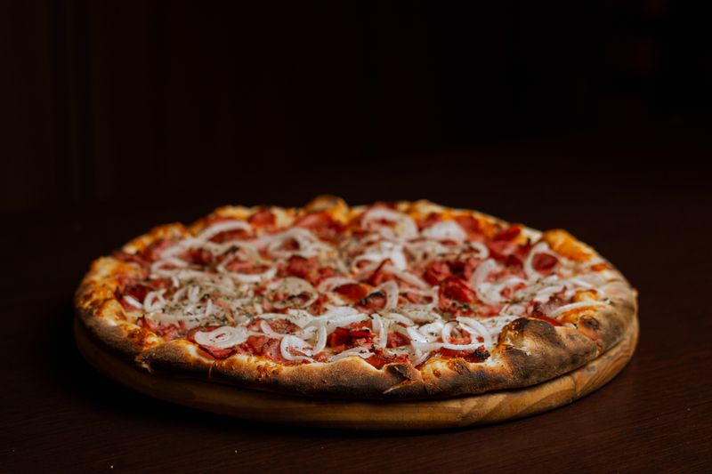pizza luce Margherita pizza with fresh basil and mozzarella
